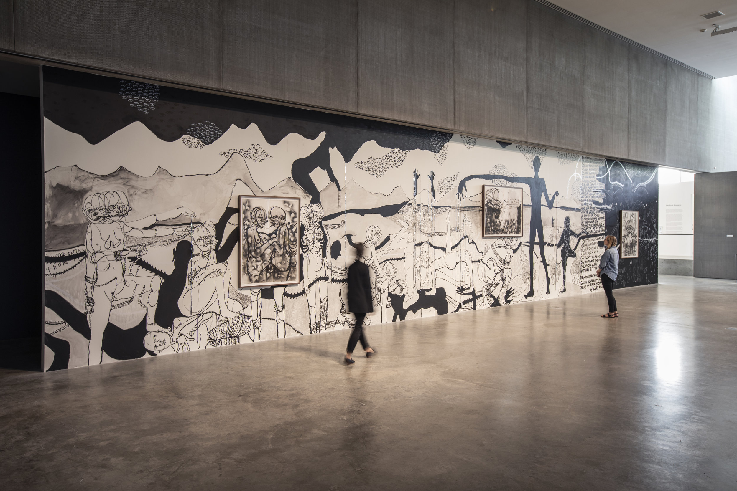    Sometimes it hurts  , 2018  12.5 x 60 ft.  Ink wash and acrylic paint  Installation view,  William Downs: Sometimes it hurts , Contemporary Art Museum St. Louis, September 7–December 30, 2018.  Photo: Dusty Kessler. 