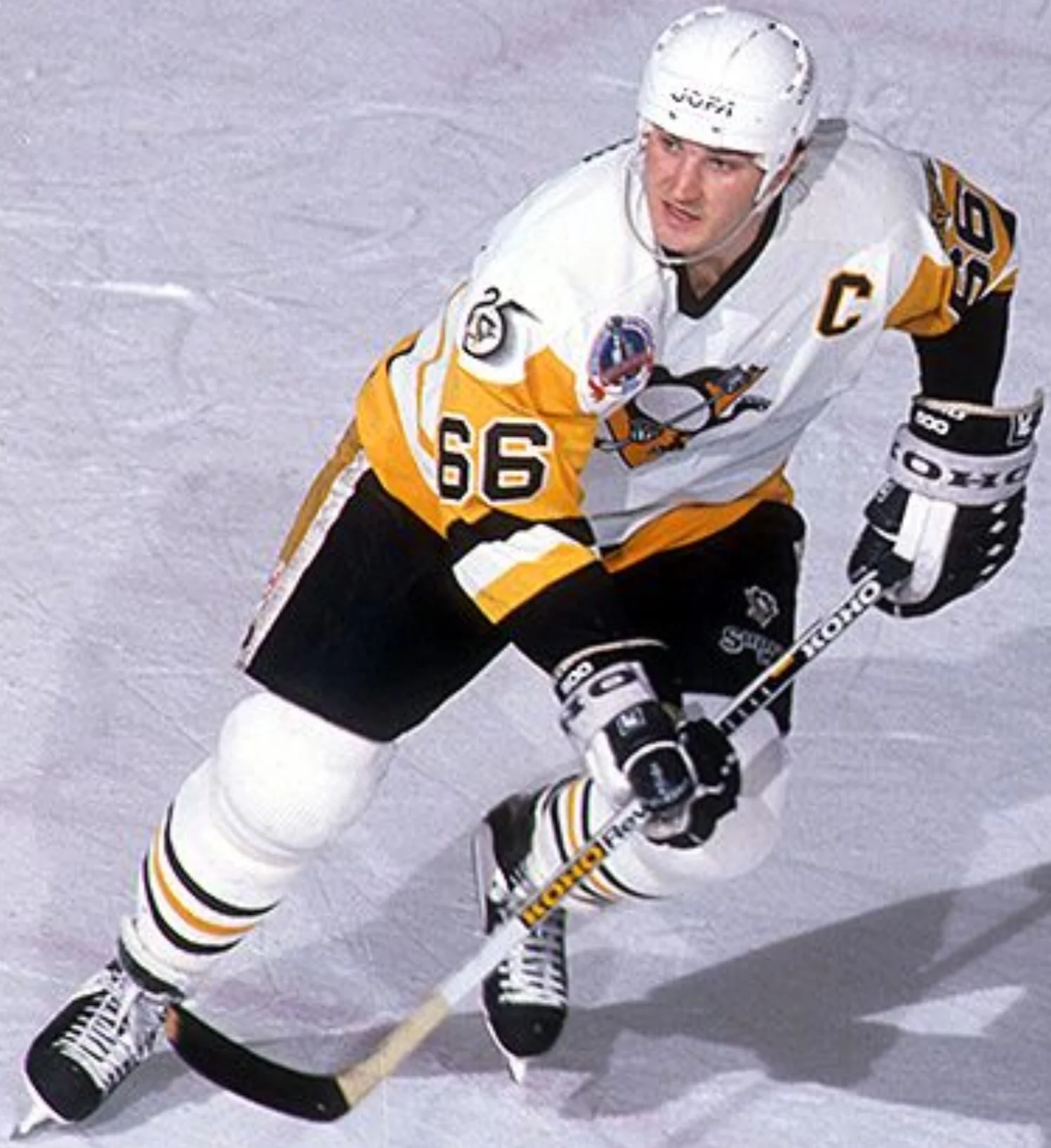Mario Lemieux looks for a breakout pass and a chance to head up ice.
