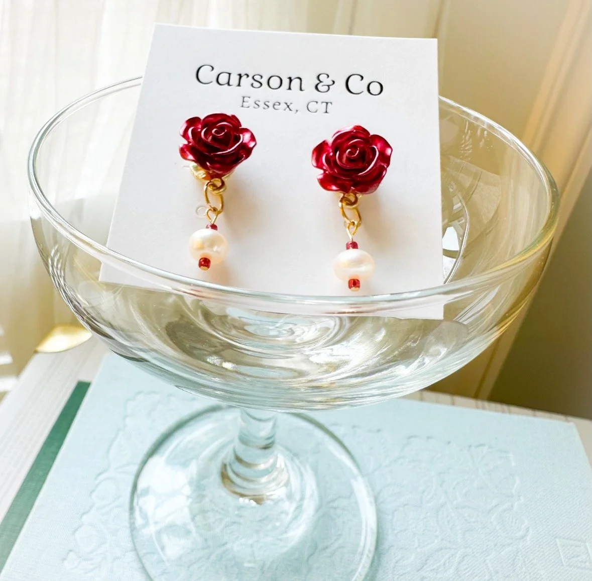 rose stud earrings with real pearls in a champagne coup