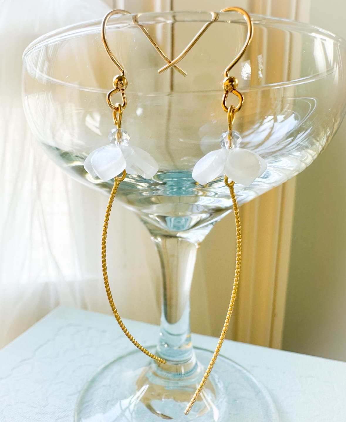 white mother of pearl floral earrings.