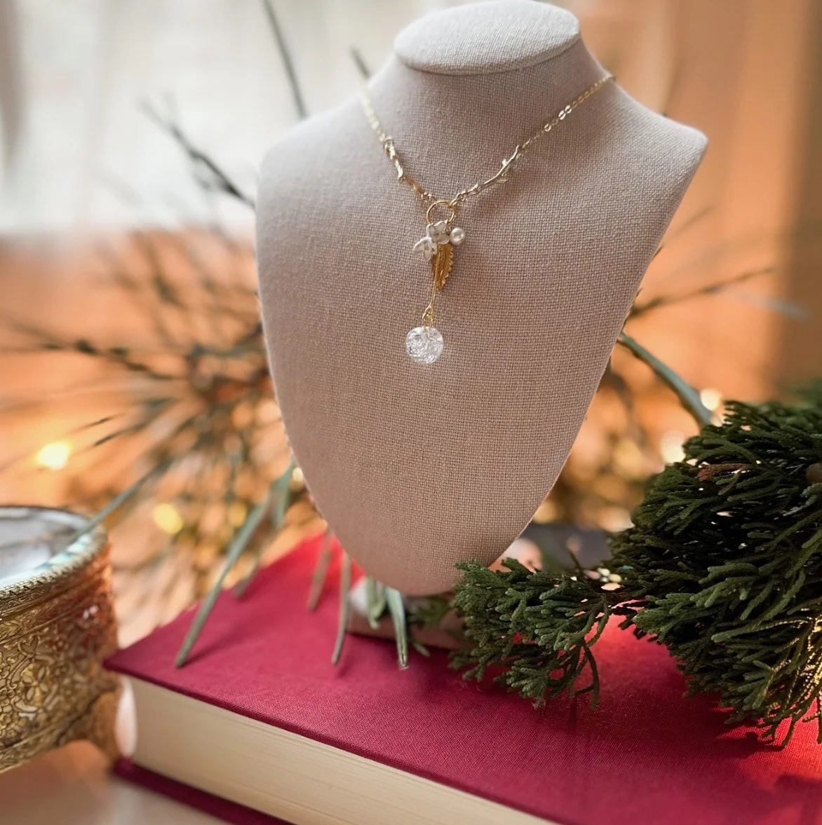 sparkly snowglobe like bead on a necklace