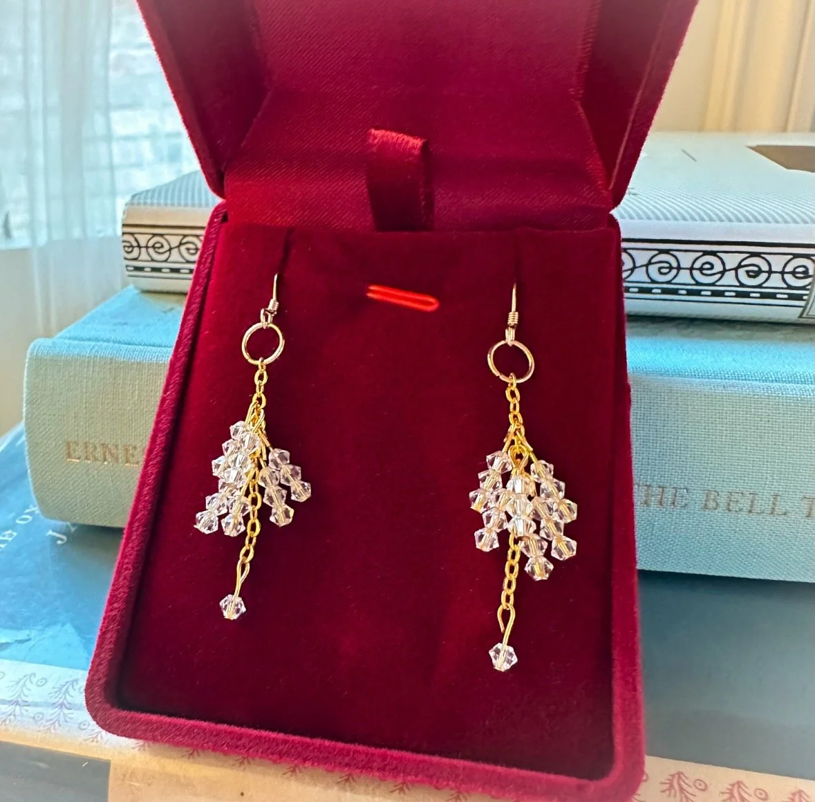 Christmas sparkle crystal dangle earrings in red velvet box.