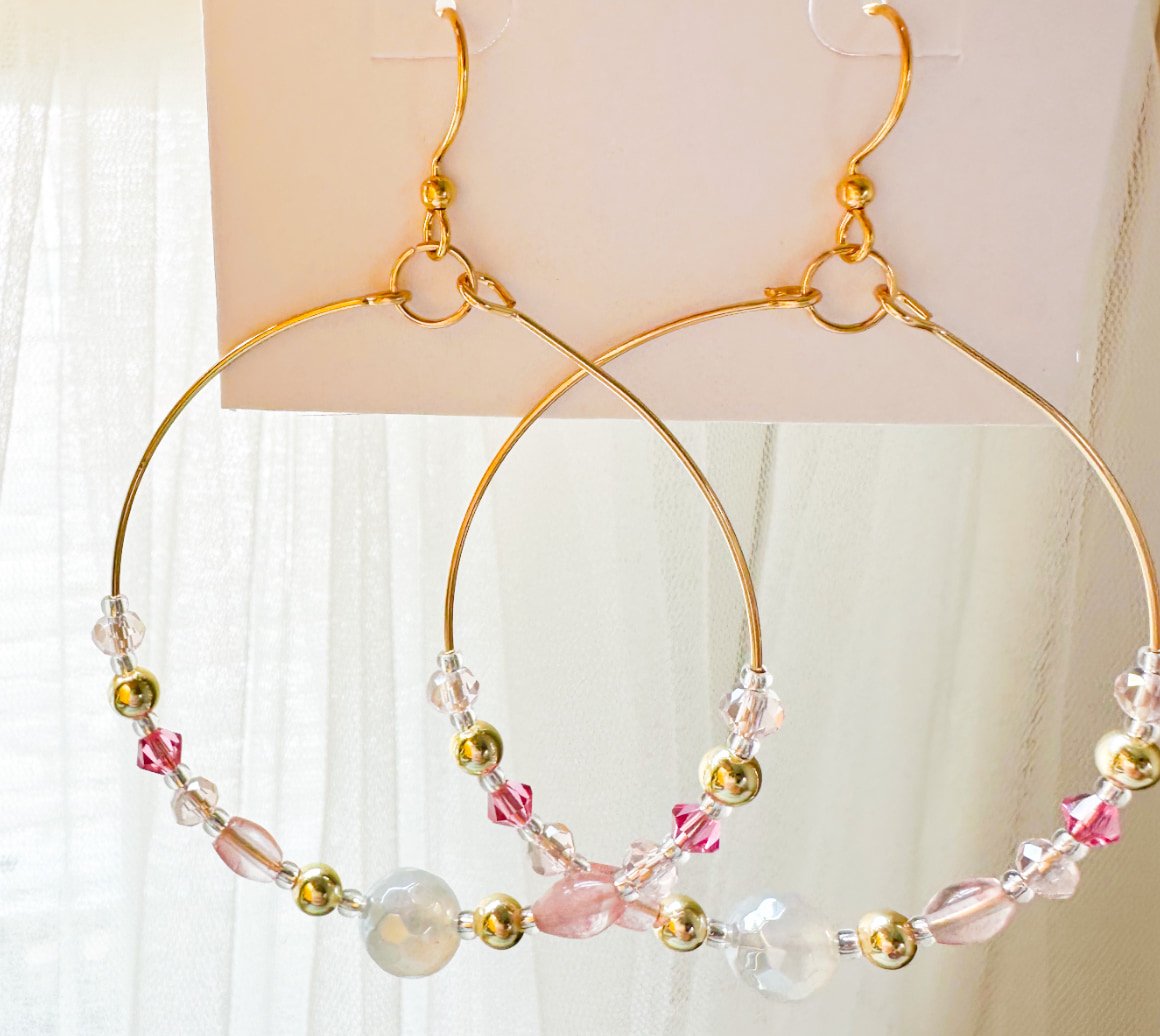 large hoop earrings, pink and gold beads, shining