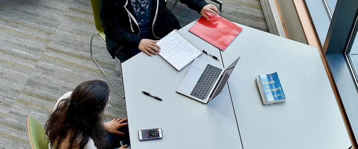 Photo of two students at Boston University's writing center