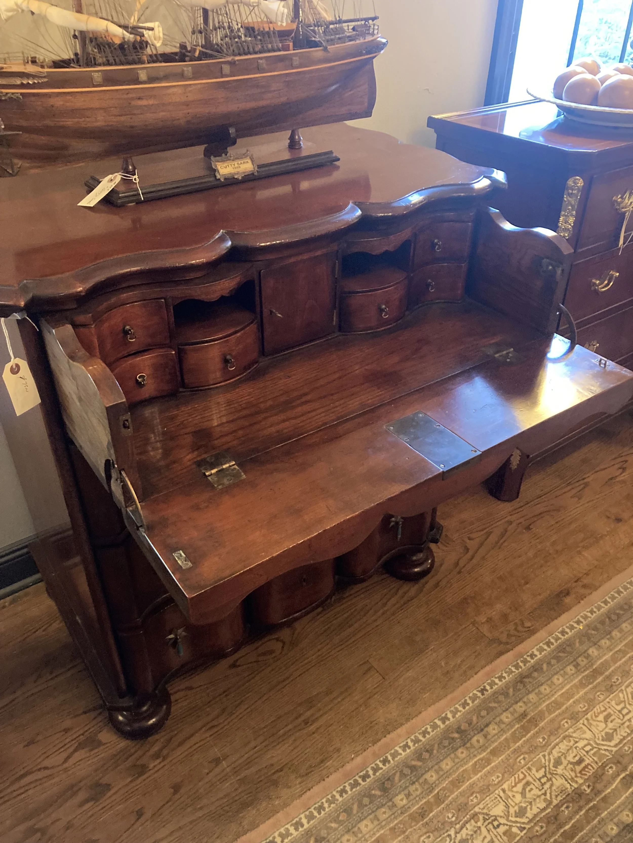 English oak secretary desk over chest of drawers
