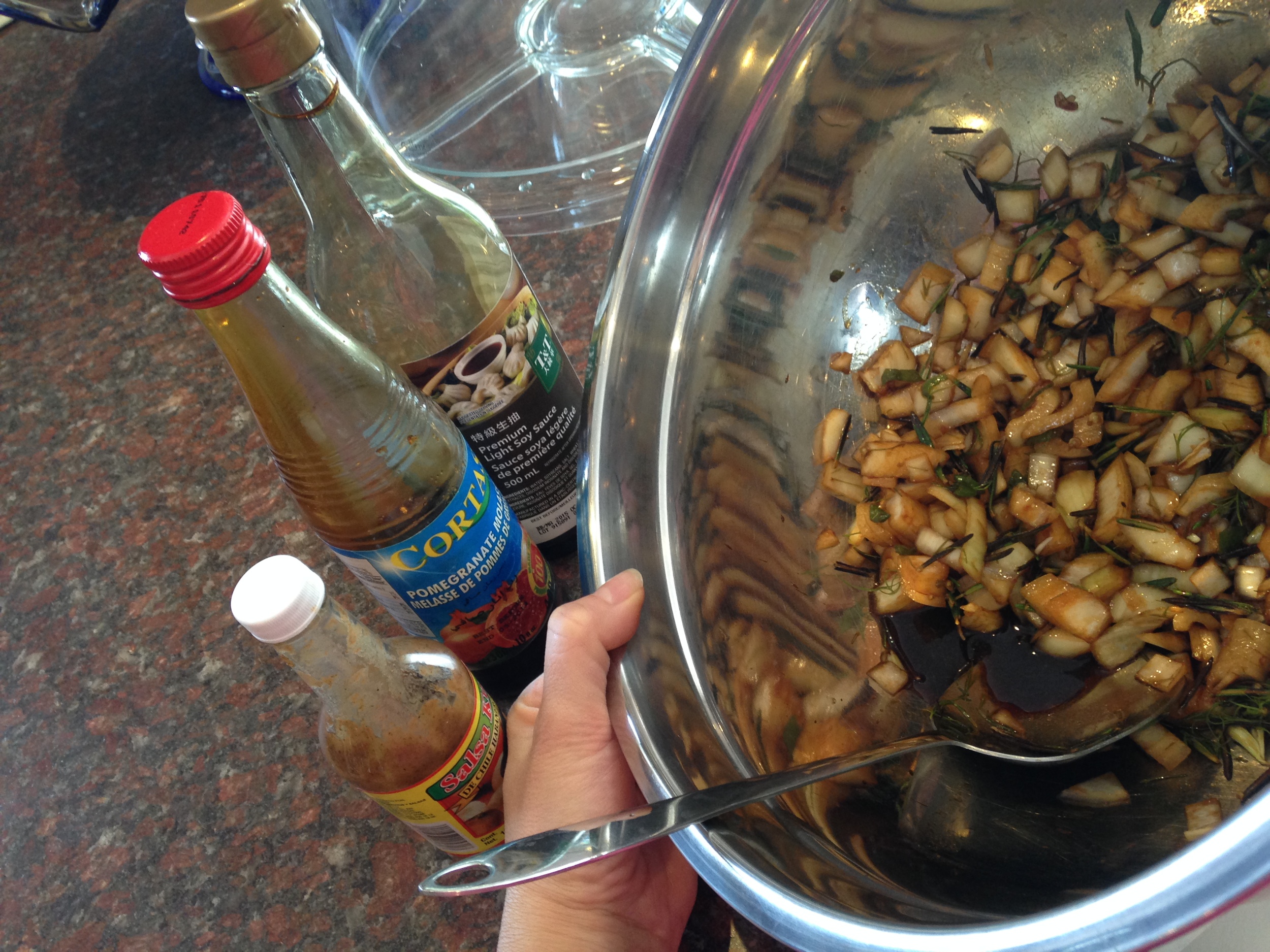 tHE ONIONS, GARLIC, HERBS AND SPICES MIXED TOGETHER WITH THE sOY sAUCE IN A LARGE BOWL PRIOR TO COOKING.