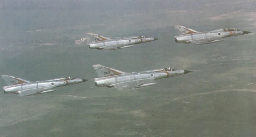 THE DASSAULT MIRAGE IIICJ (WHICH WAS THE ISRAELI-EXPORT VERSION) WAS A FRENCH-BUILT DELTA-WING FIGHTER CAPABLE OF TRAVELING AT SPEEDS EXCEEDING MACH 2. THE AIRCRAFT WAS USED BY THE IAF FOR BOTH GROUND ATTACK AND AERIAL DOGFIGHTING, A TASK AT WHICH IT EXCELLED. SO SUCCESSFUL WAS THE DESIGN THAT IT EVENTUALLY WAS DEVELOPED INTO THREE OTHER AIRCRAFT BY DASSAULT. PHOTO CREDIT: HTTP://WWW.OOCITIES.ORG/CAPECANAVERAL/HANGAR/2848/MIRAGE.HTM