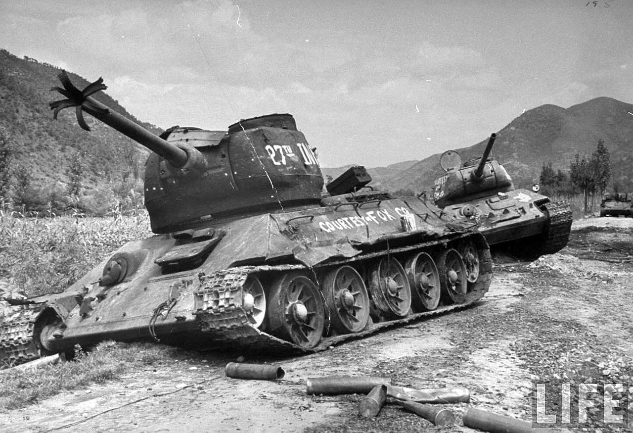 A pair of T-34/85s knocked out after the Battle of Osan. Arguably the greatest tank design of World War II, the T-34/85 was simple, featured sloping armor providing adequate protection, and an 85mm main gun that was very effective against other tanks. Source: Life Magazine.