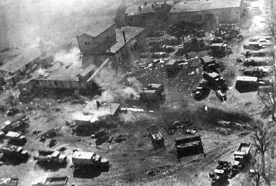 Another in-flight picture taken during a Shturmovik attack, this time the target of the attack appears to be a German motor pool or headquarters.