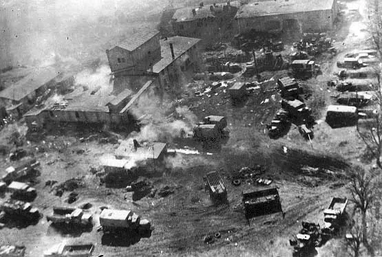 Another in-flight picture taken during a Shturmovik attack, this time the target of the attack appears to be a German motor pool or headquarters.