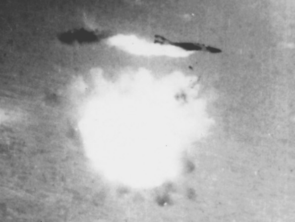 A USAF F-4 Phantom is hit by an SA-2 SAM over Vietnam.