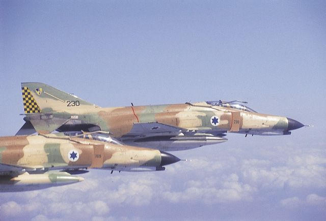 Two Israeli F-4 Phantoms fly in formation.