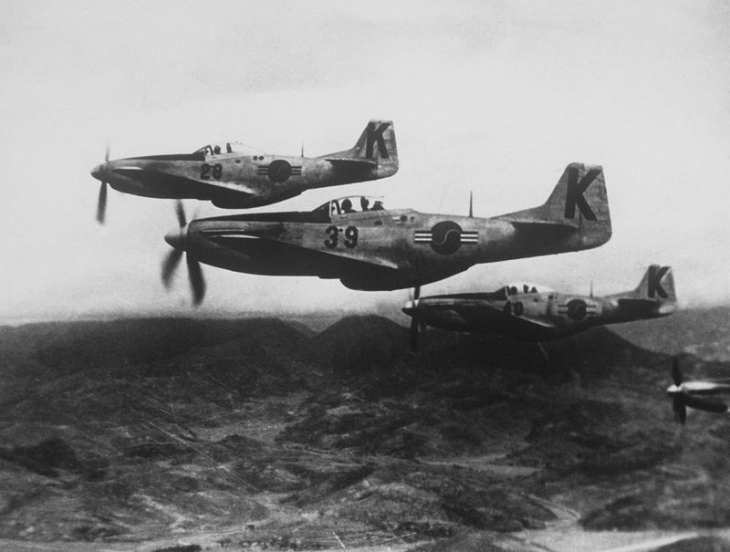 When the Korean War broke out in 1950, the Mustang was the most readily available aircraft that could be sent to reinforce the US 5th Air Force and ROKAF. These P-51Ds, painted in ROKAF markings, were likely handed over by USAF units after they converted to jets. THe Mustang was the primary close air support weapon during the first year of the war. Source: Wikipedia.