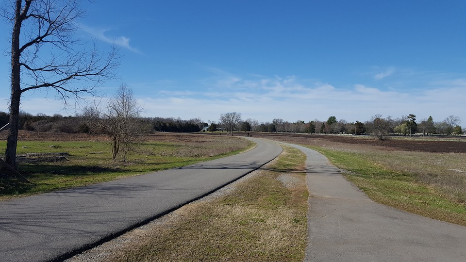 A road and pedestrian path wind through the cotton field - the scene of the last Confederate assaults on December 31st- the Union had dug in along the turnpike, the position of which would be along the ride side of this picture. 