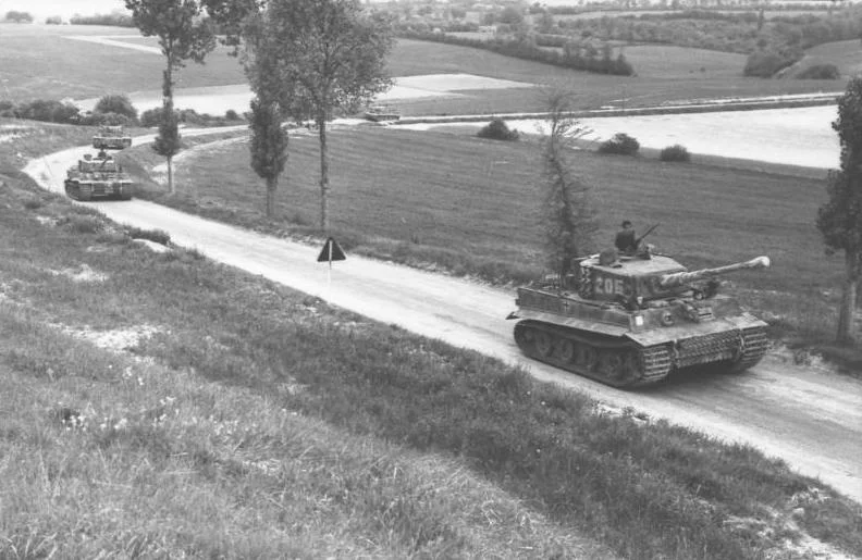 A column of Tiger Is on the move in Northern France in the summer of 1944. Photo source: Wikipedia.
