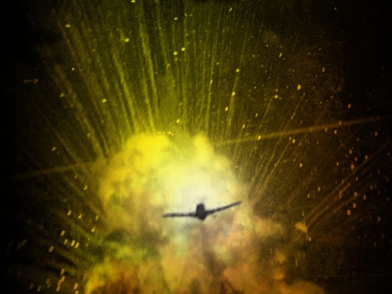 In this well-known provocative photo, a P-47 piloted by Captain Ray Walsh of the 406th Fighter Squadron pulls up from strafing an ammunition truck, which has exploded violently. Ground attack missions against potentially volatile targets such as amm…