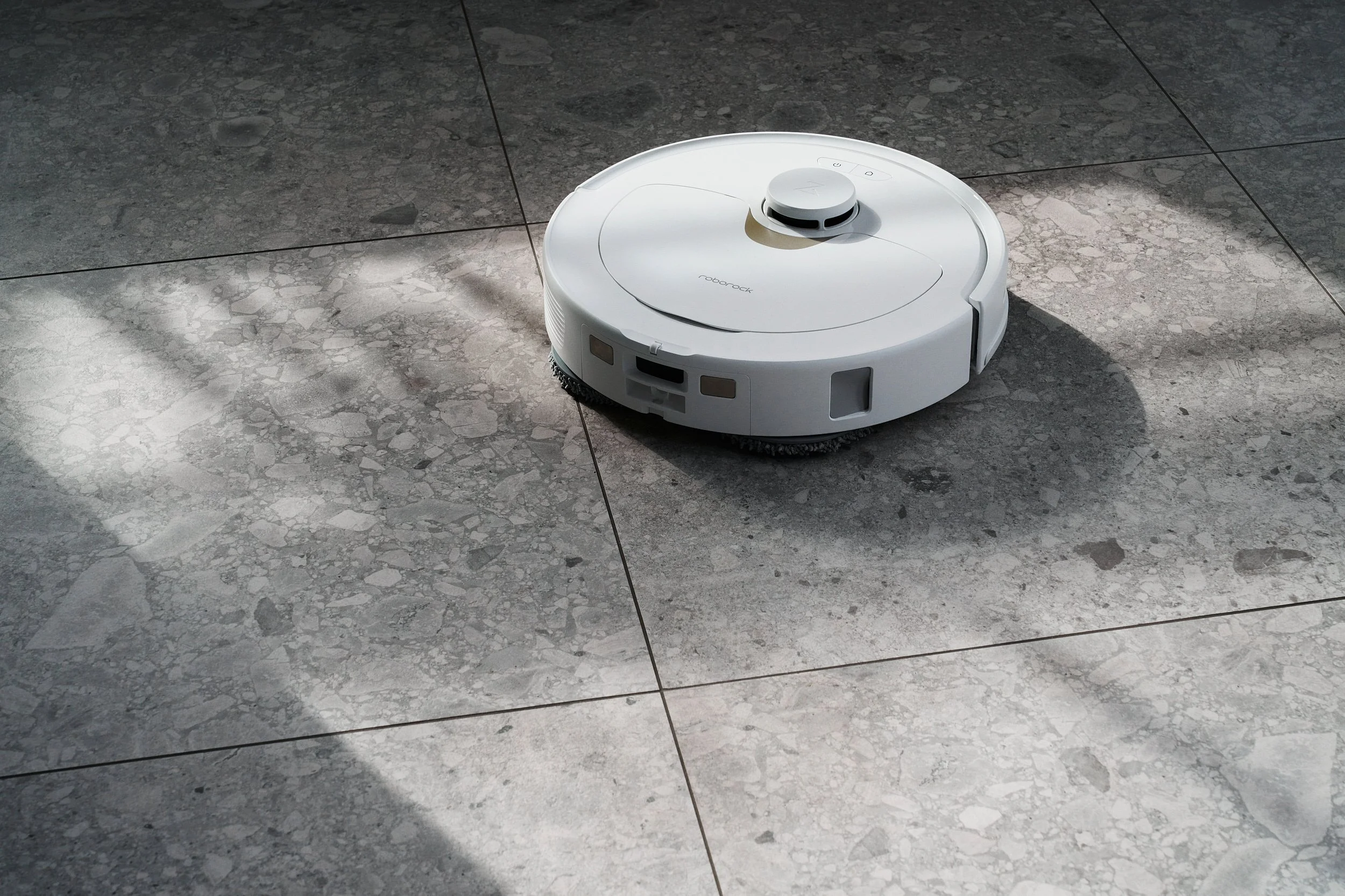 A close-up of the cleaner being sprayed on a tile floor, with emphasis on its gentle yet effective nature copy.jpg