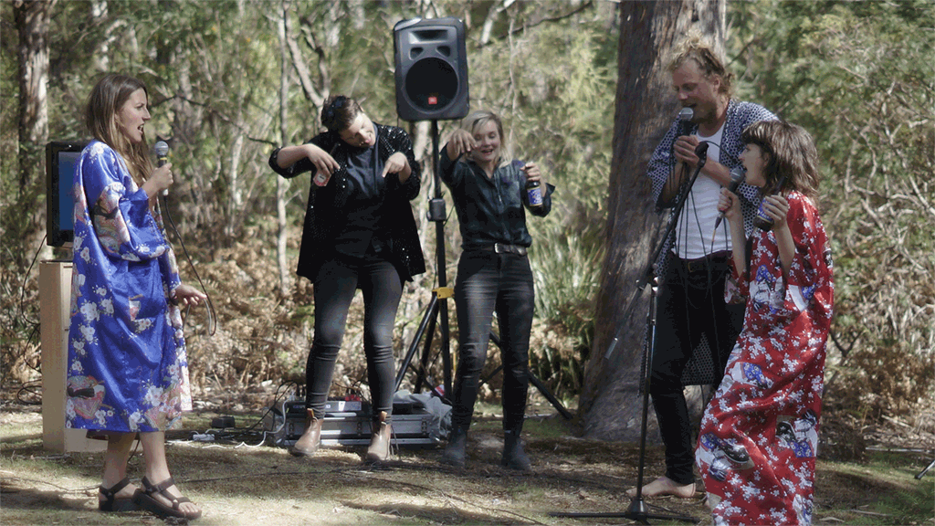 Nature Karaoke with Hobiennale 2017 organisers Grace Herbert (left), Alex Hullah (middle), Liam James (second from the right). GIF by Thomas Capogreco.