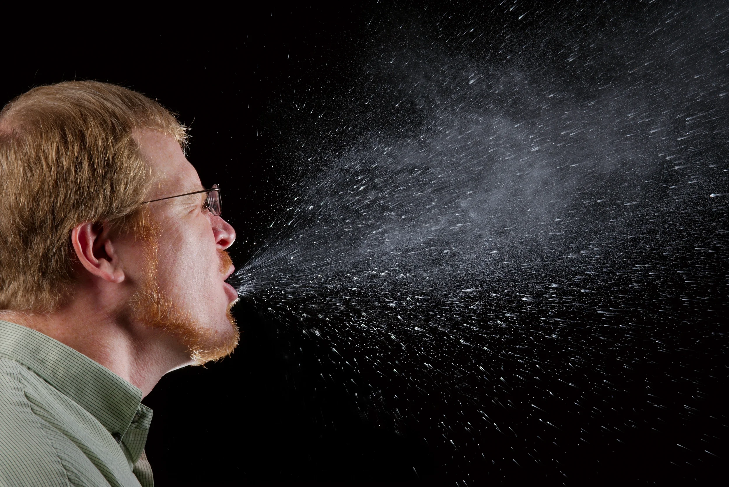 Don't underestimate how far sneeze droplets can get in dry air. Always cover your mouth when you sneeze (or cough)!
