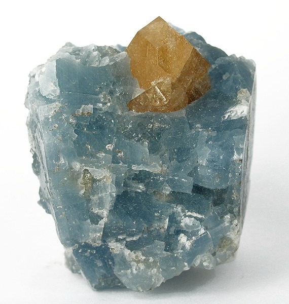 Calcite can turn blue when exposed to radiation. Photo by Rob Lavinsky.