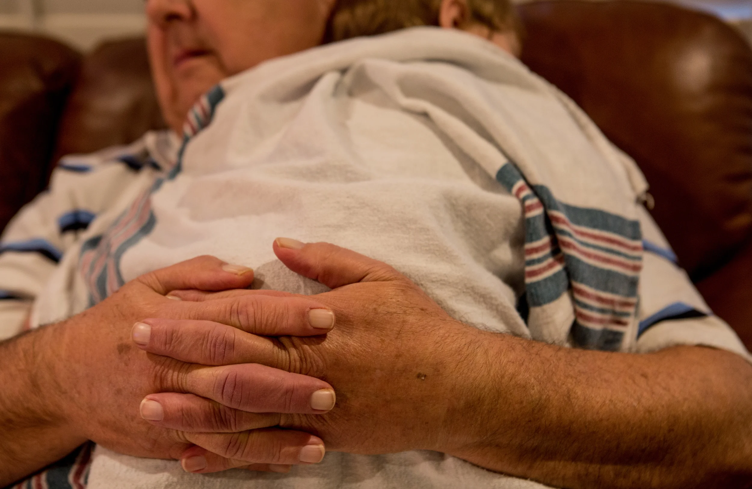   Gary Young holds his youngest grandson, Ethan. His wife, Betty, explains that it’s his grandbabies that bring the most joy to Gary and helps him avoid his PTSD.  
