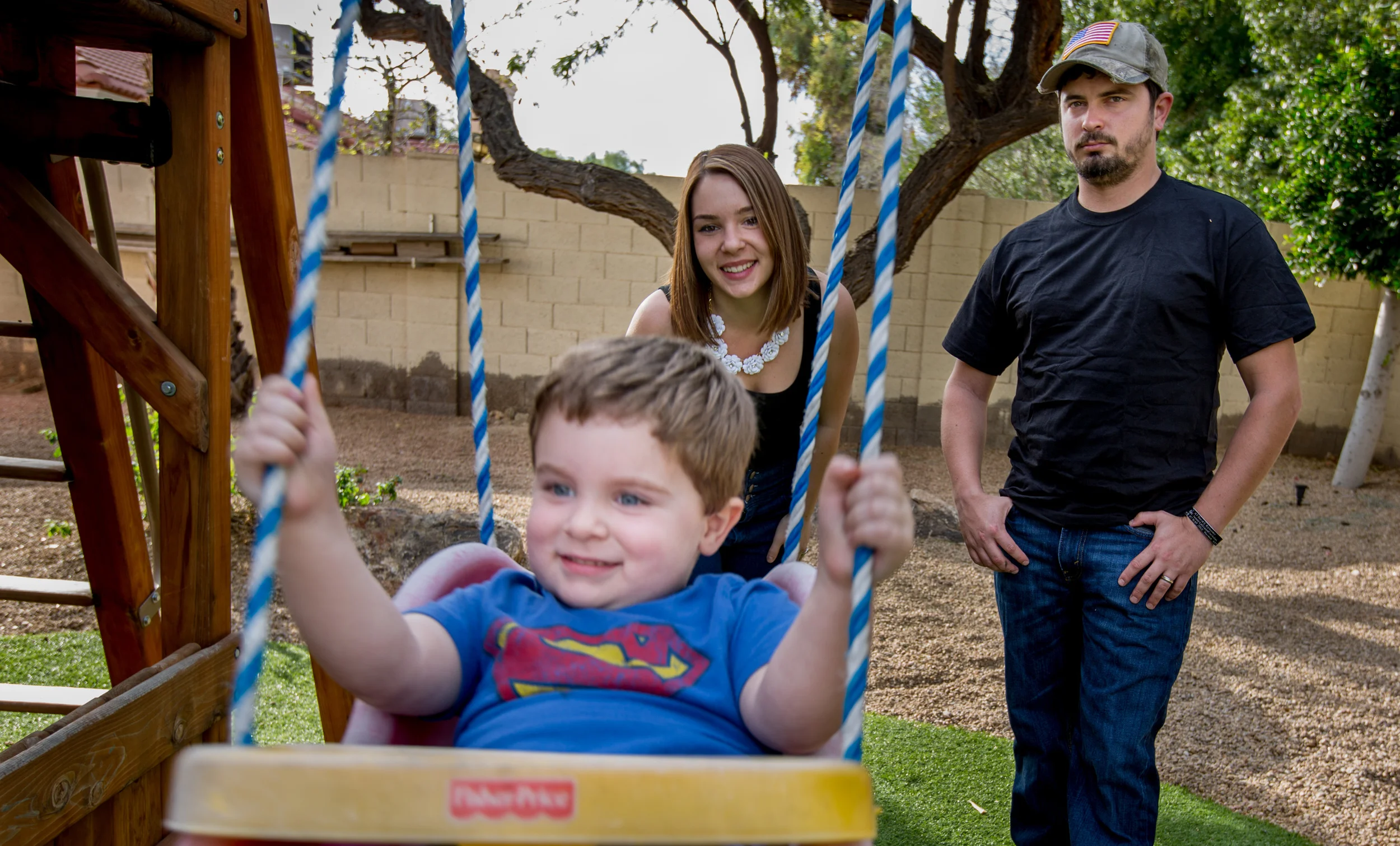   In a collaborative photograph, Josh Quigg creates an image that describes what it means to live with PTSD. He wants to be there for his family, but sometimes the PTSD pulls him back to Afghanistan.  (Photo by Kara Frame and Joshua Quigg) 