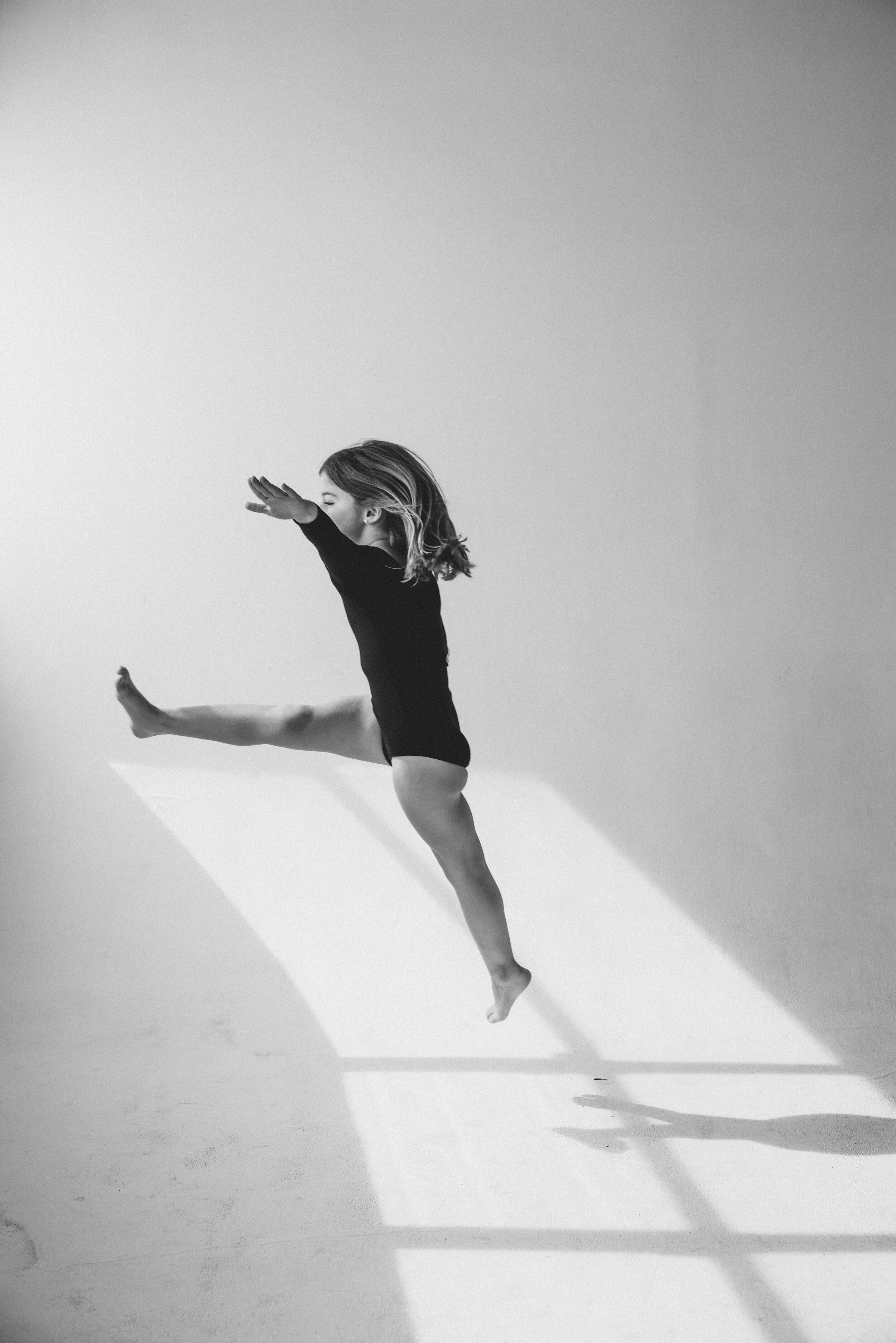 miami-family-photographer-girl-dance-leap-studio-portrait.jpg
