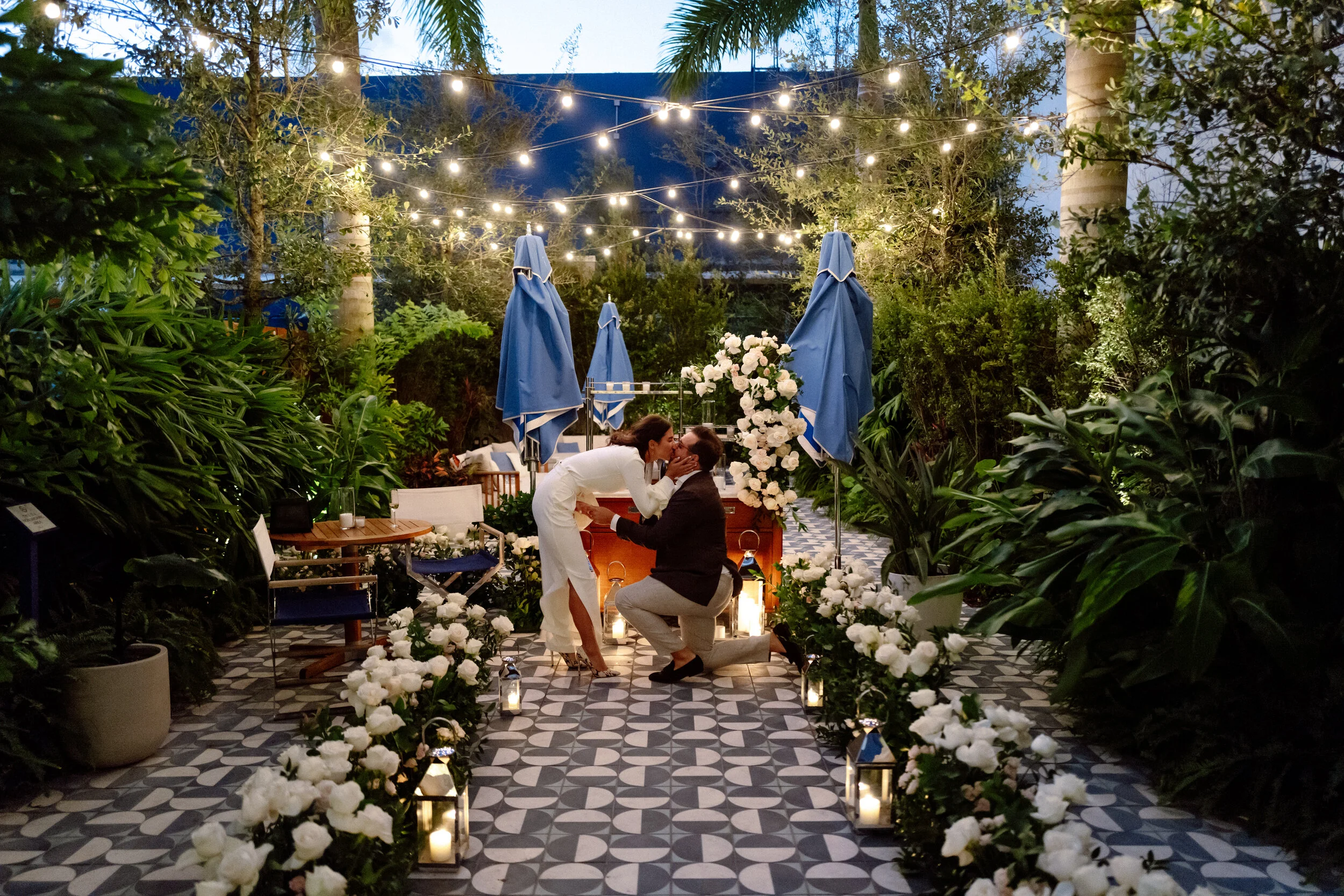 miami-celebration-photographer-proposal-tiled-path-floral-arch.jpg