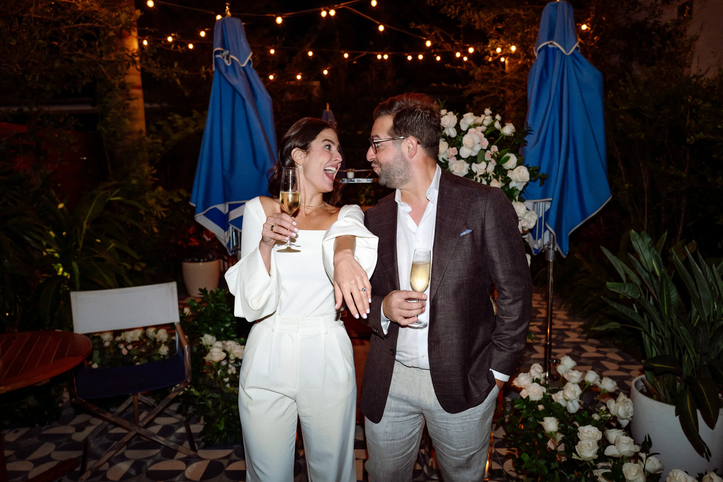 miami-celebration-photographer-couple-toast-garden-party.jpg