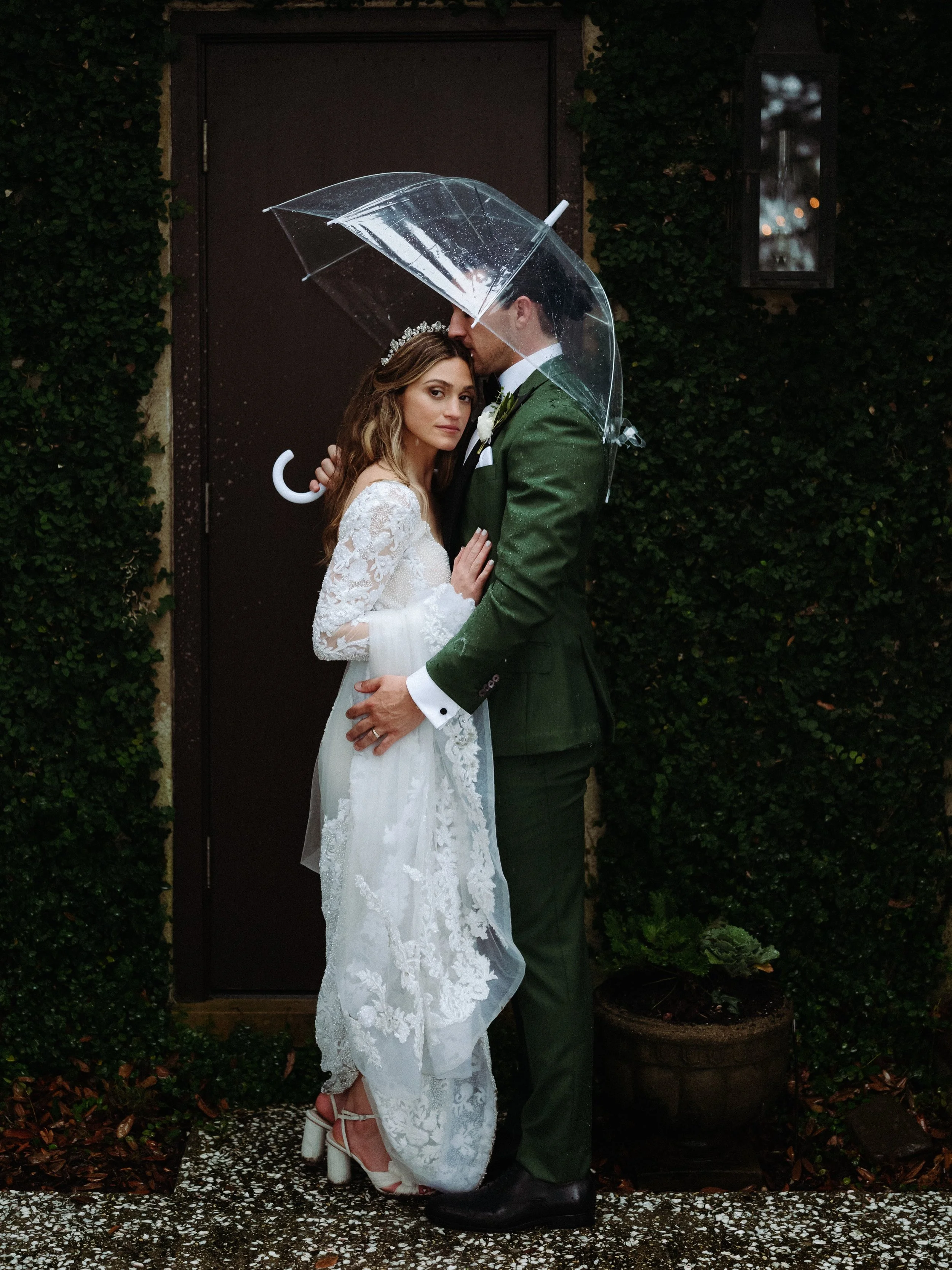 Some of our favorite frames have been made in the rain. A little bit of chaos, rawness, laughter and shadows. Rain doesn&rsquo;t ruin a wedding, sometimes it becomes the wedding.