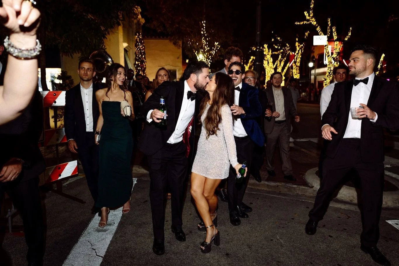 In this city, sometimes the reception just has to keep going. Rooftop to neighborhood bar, but make it wedding attire.