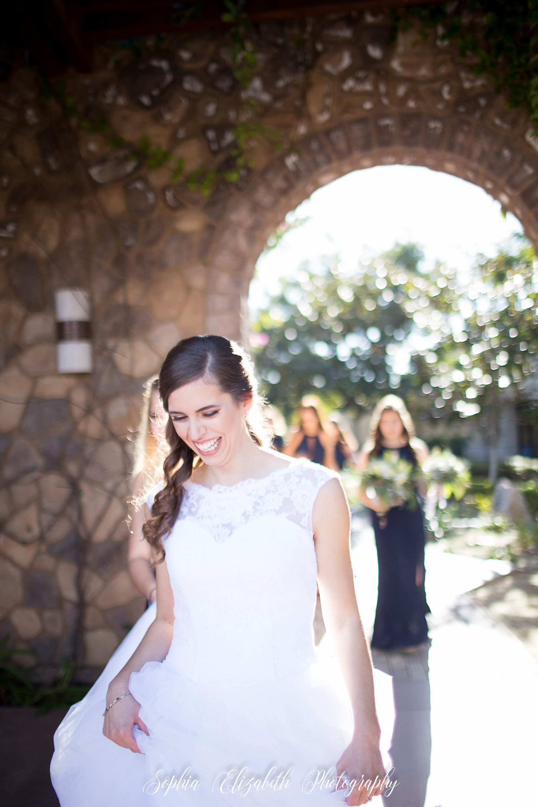 bride-walking-bridesmaids-del-mar-wedding