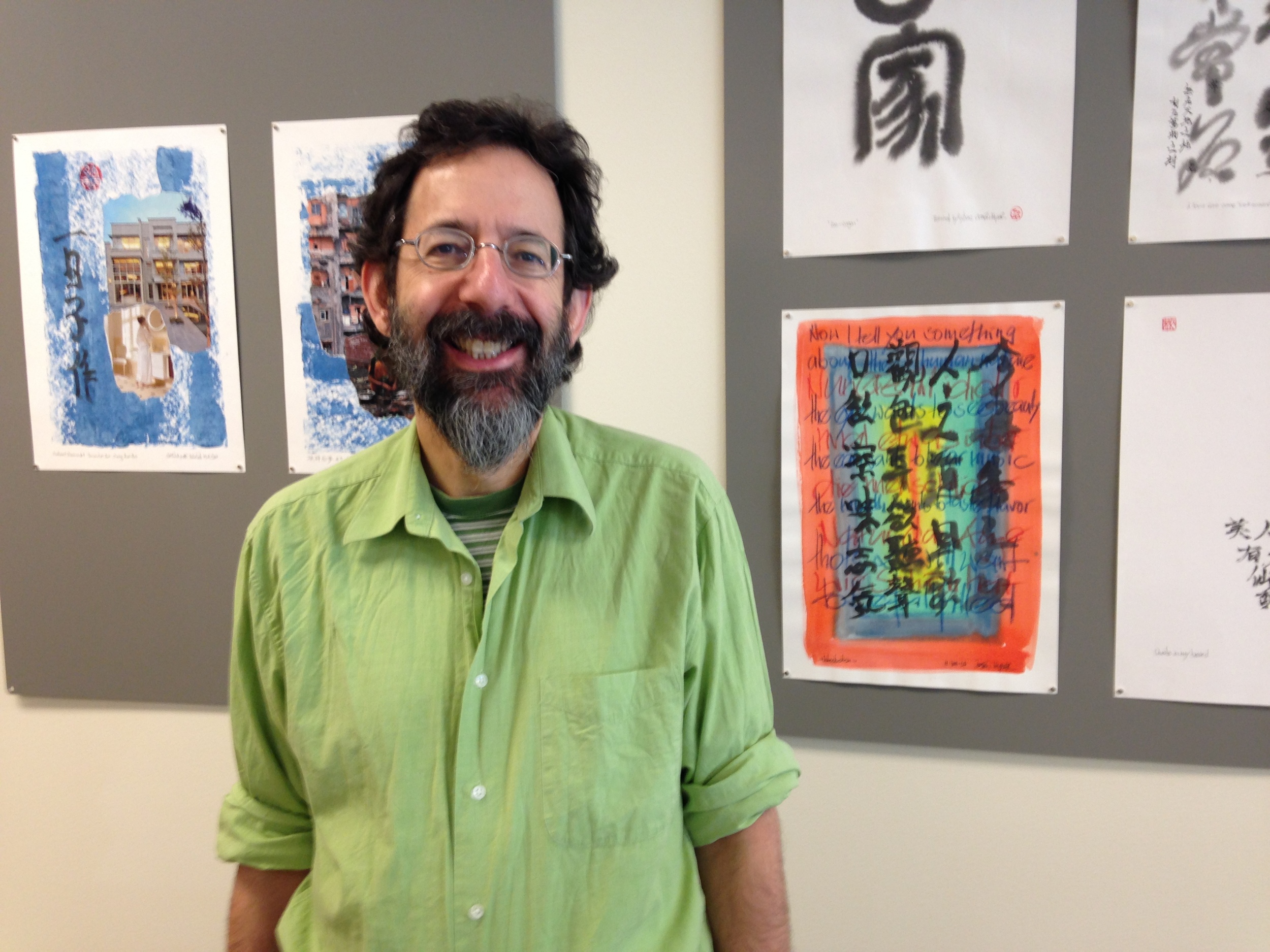 David Abel with calligraphic paintings by Stefan Hyner, a German poet and translator of Chinese poetry.