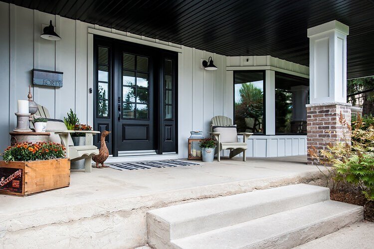 Heaven&rsquo;s a julep on the porch.
.
.
.
.
#yeg #yegexterior #exteriors #modernfarmhouse #farmhouse #modernfarmhouseexterior #exteriorhome #blackdoor #brick #boardandbatten #blackandwhite #porch #frontporch #frontporchdecor