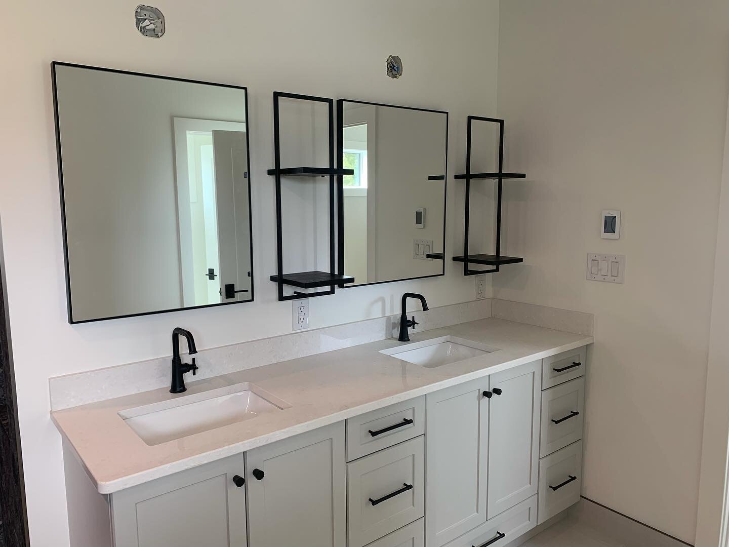 If you&rsquo;re going to wash your hands 30 times a day, it might as well be in beautiful bathroom. 
.
.
.
.
#wash #dry #vanity #washroom #bathroom #reno #designbuild #jackandjill #matteblackfaucet #faucet #sink #mirror #blackmirror