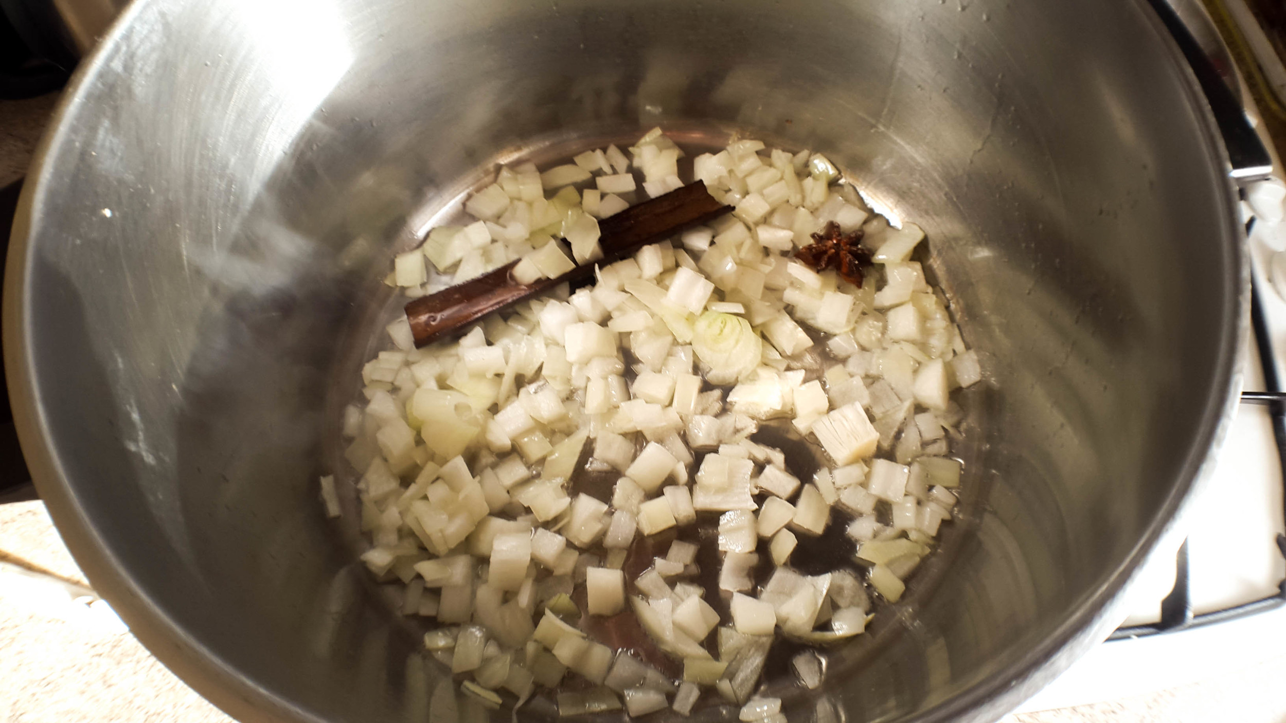  Frying the spices and then the diced onion until golden brown. I would have added curry leaves too but I didn't realise I had run out at this point. 