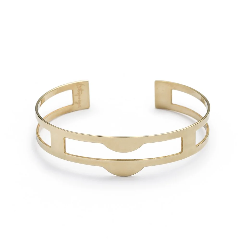 Makou_cuff_betsy_iya_adjustable_brass_cuff_with_geometric_negative_cutouts_1024x1024.jpg