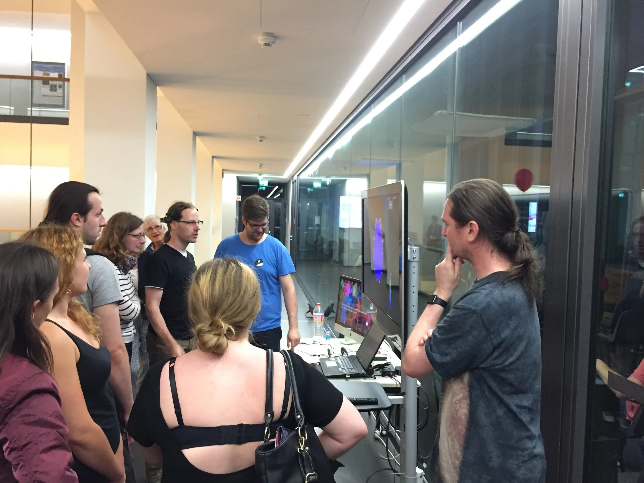 Anton Komissarov demonstrating the features of the real time brain visualisation application, and focus/relaxation based game by BrainModes.