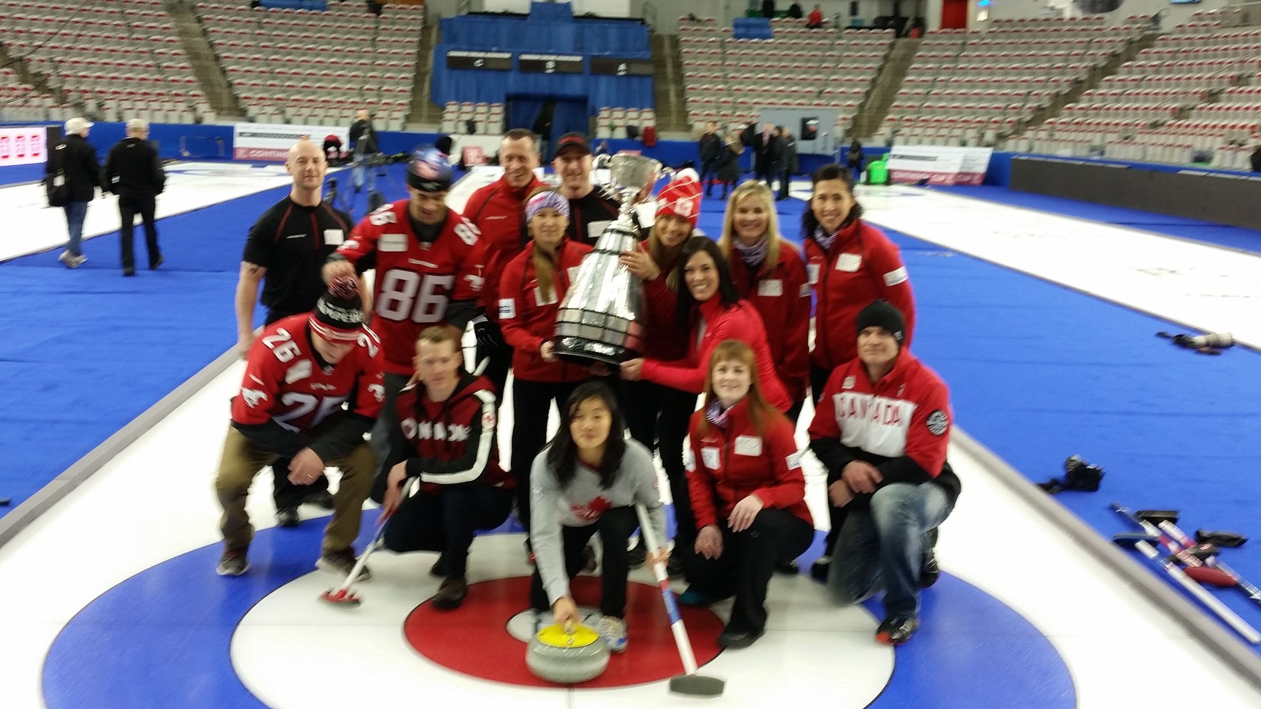 After teaching some fellow athletes to curl including a couple of Grey Cup Champs