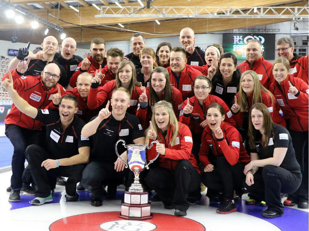 Team Canada celebrates with the Continental Cup at the Markin McPhail Centre in Calgary on Sunday. Gavin Young / Calgary Herald