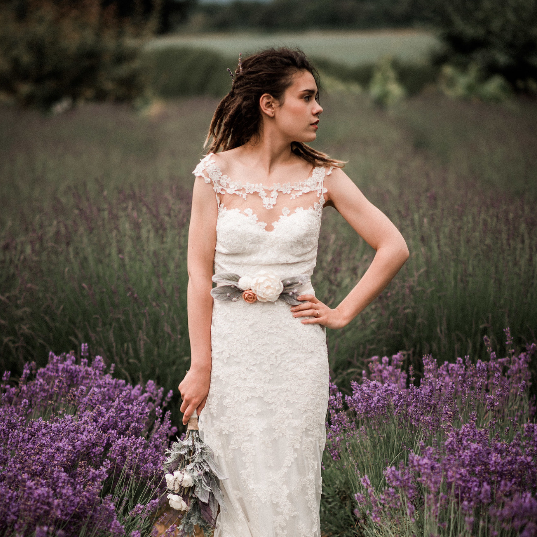 lace wedding dress and flower belt.png