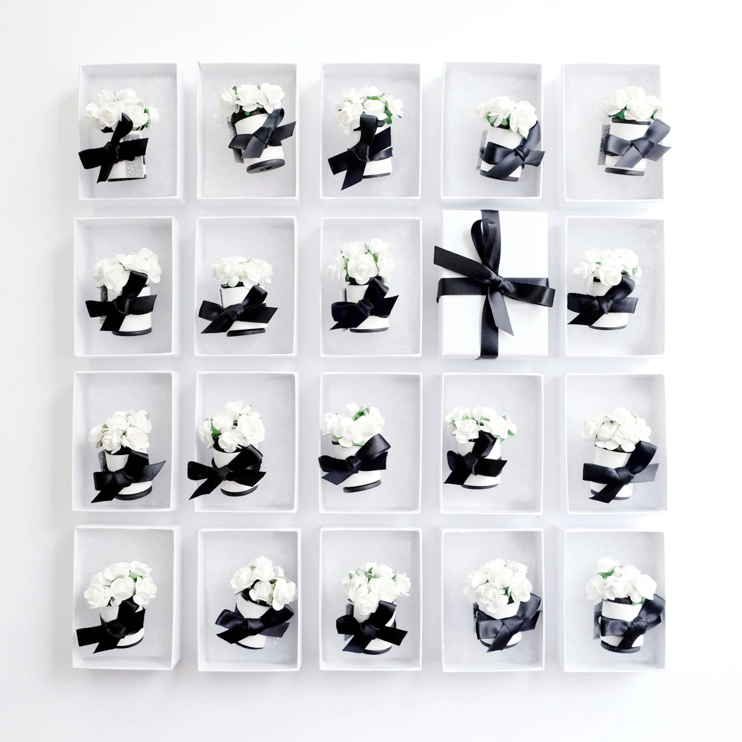 Hand-made scrolls with paper flowers and calligraphy for one-of-a-kind Save the Dates! // designed and hand-crafted by Studio Chavelli www.chavelli.com