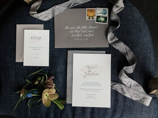 Silver foil and calligraphy wedding invitation