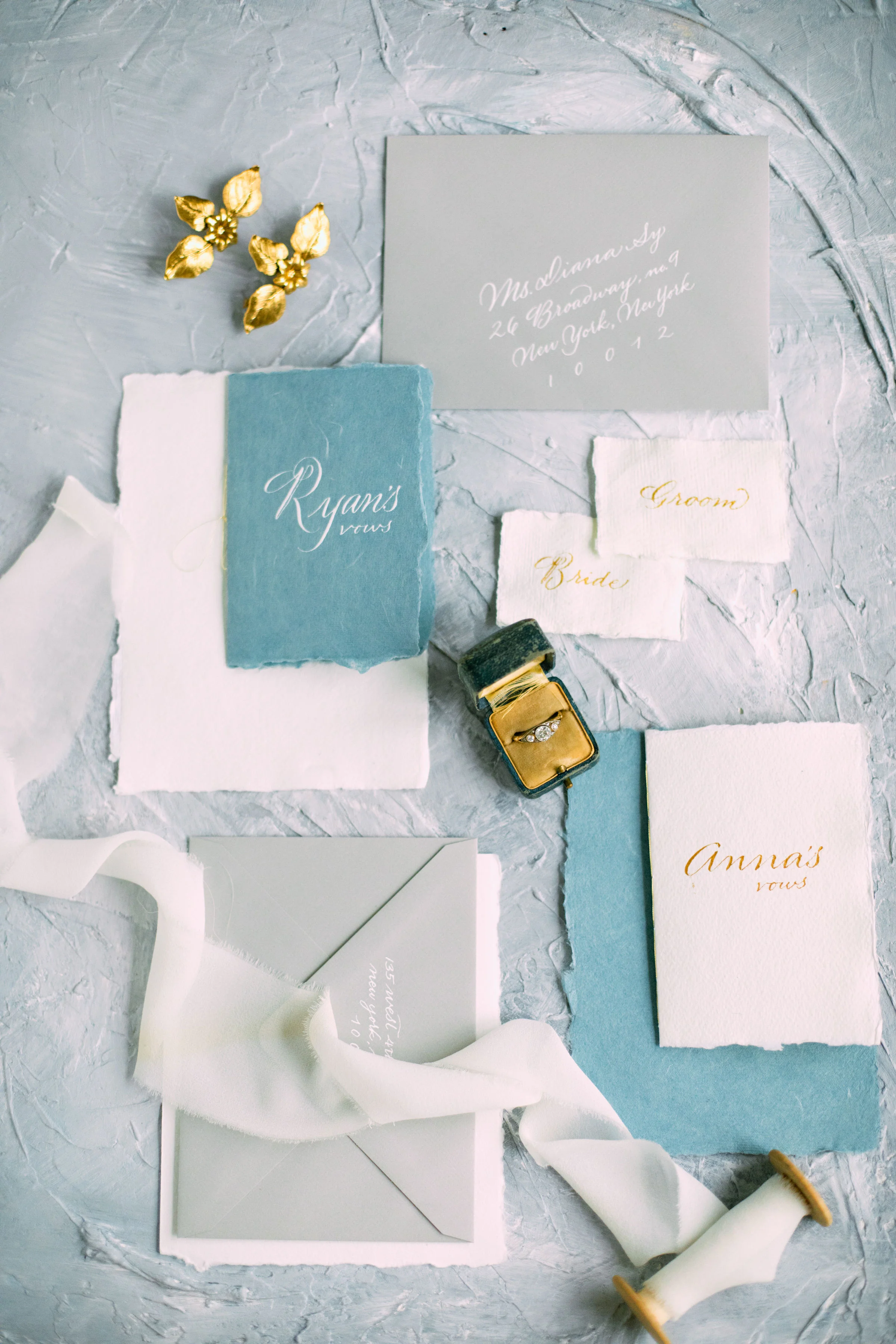 Hand-calligraphy on wedding stationery: envelope addressing, hand-written and hand-made vow booklets and placecards. Two Lovers in the Heart of New York wedding editorial shoot | www.chavelli.com
