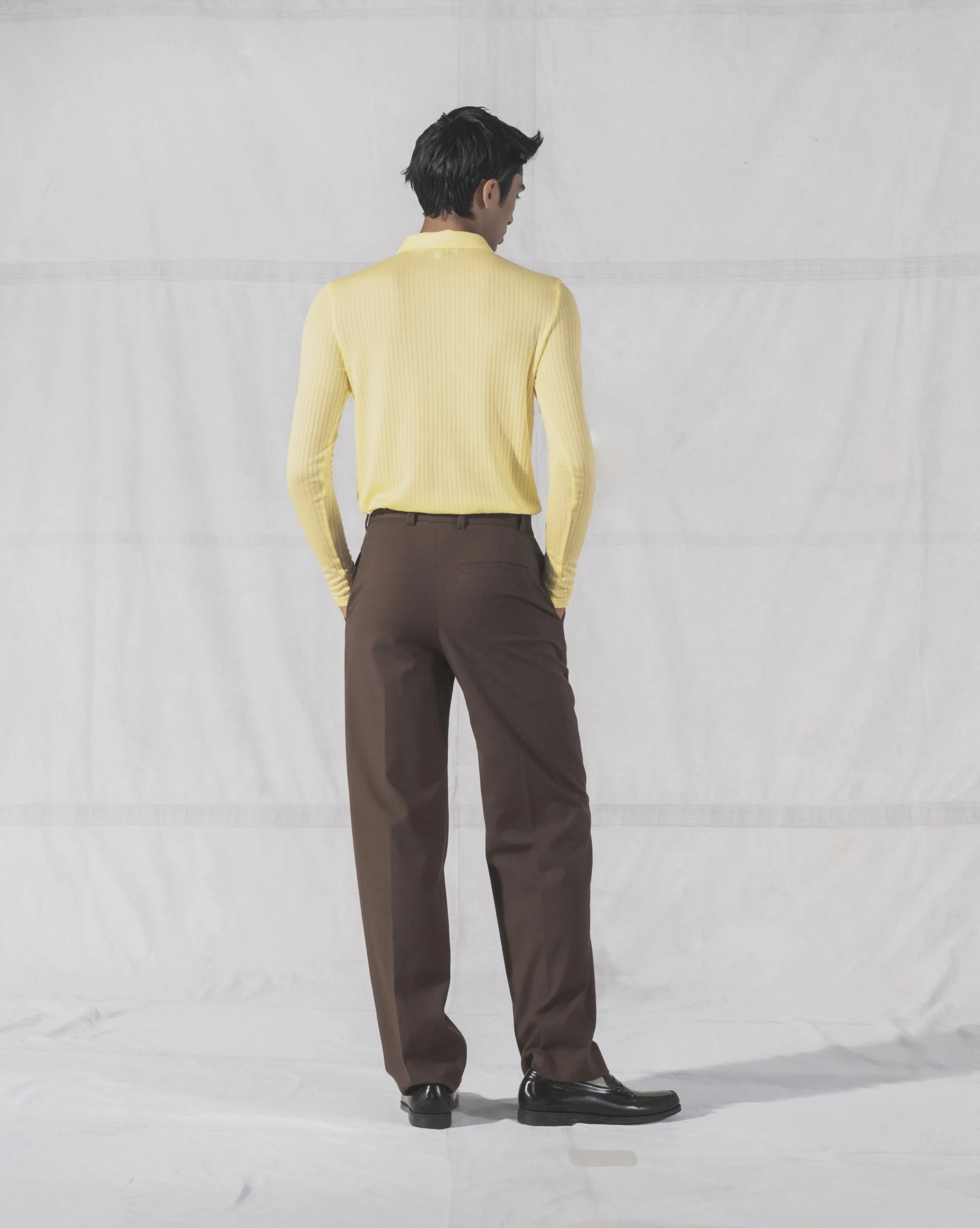 CB_SS23_yellow_poloshirt_back.jpg