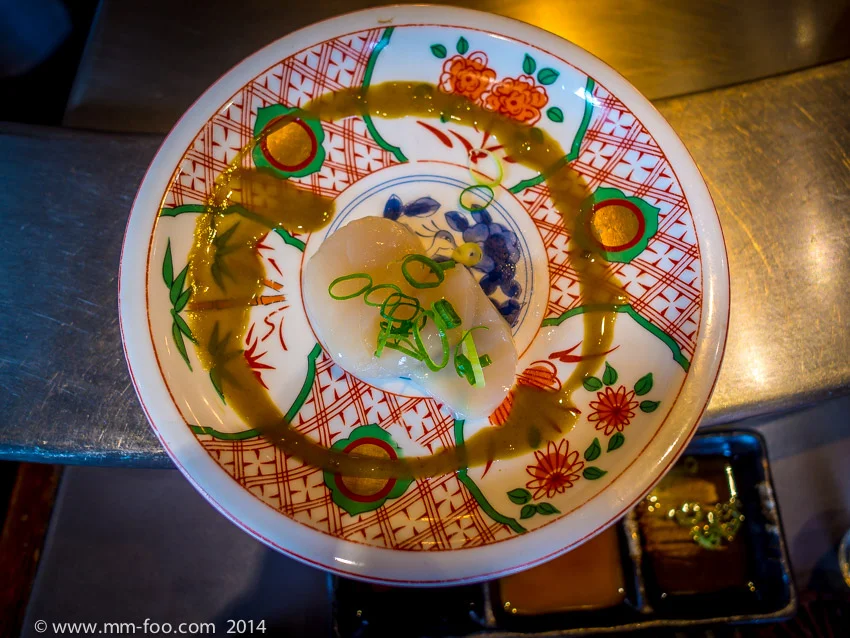 1/25 sec, 12mm, f/2.5, ISO100 Scallop Sashimi served with a Wasabi Sauce and topped with Olive Oil
