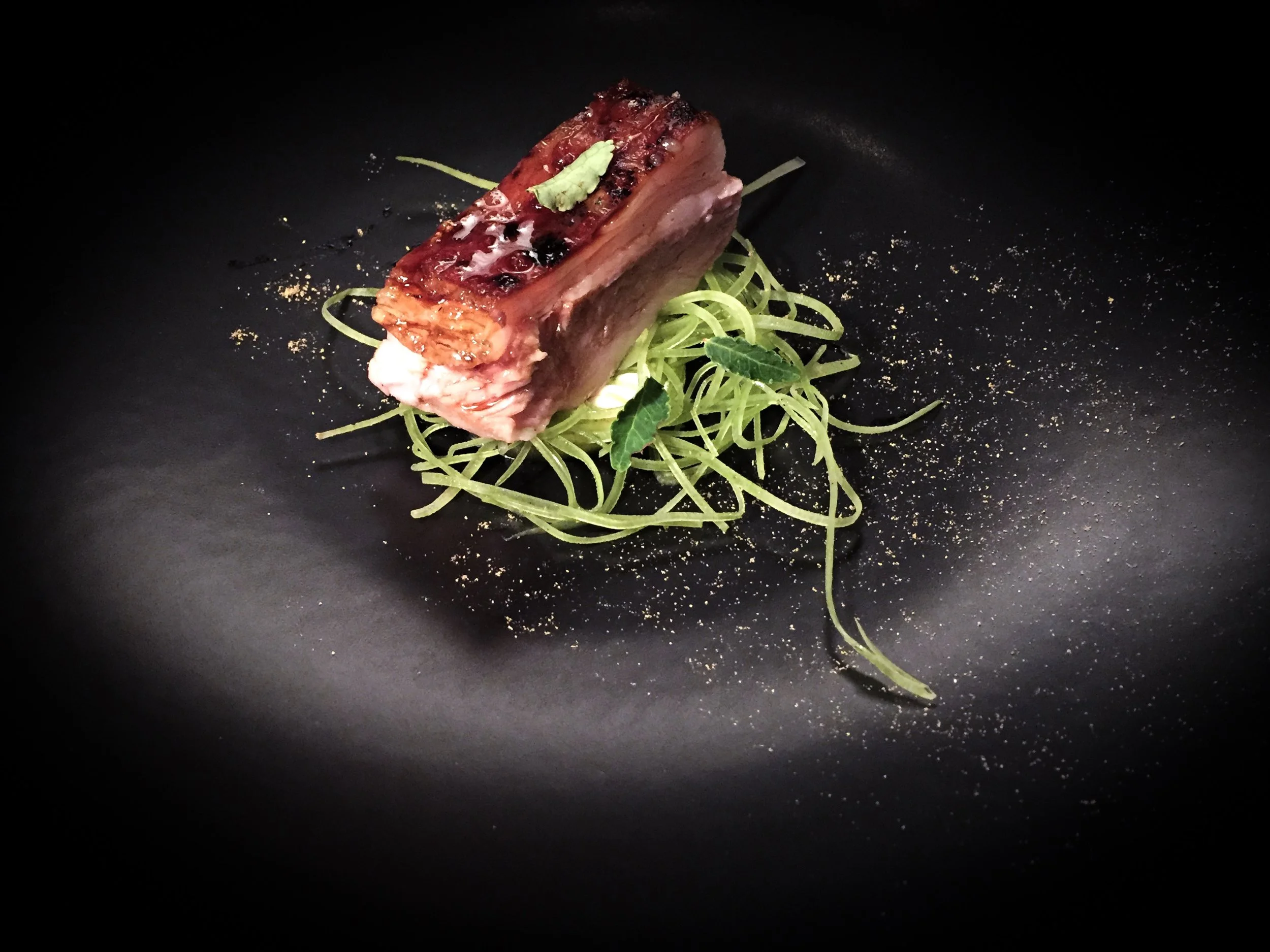 Charcoal grilled lamb breast, celtuce, cucumber oil, macadamia nut cream, sansho pepper