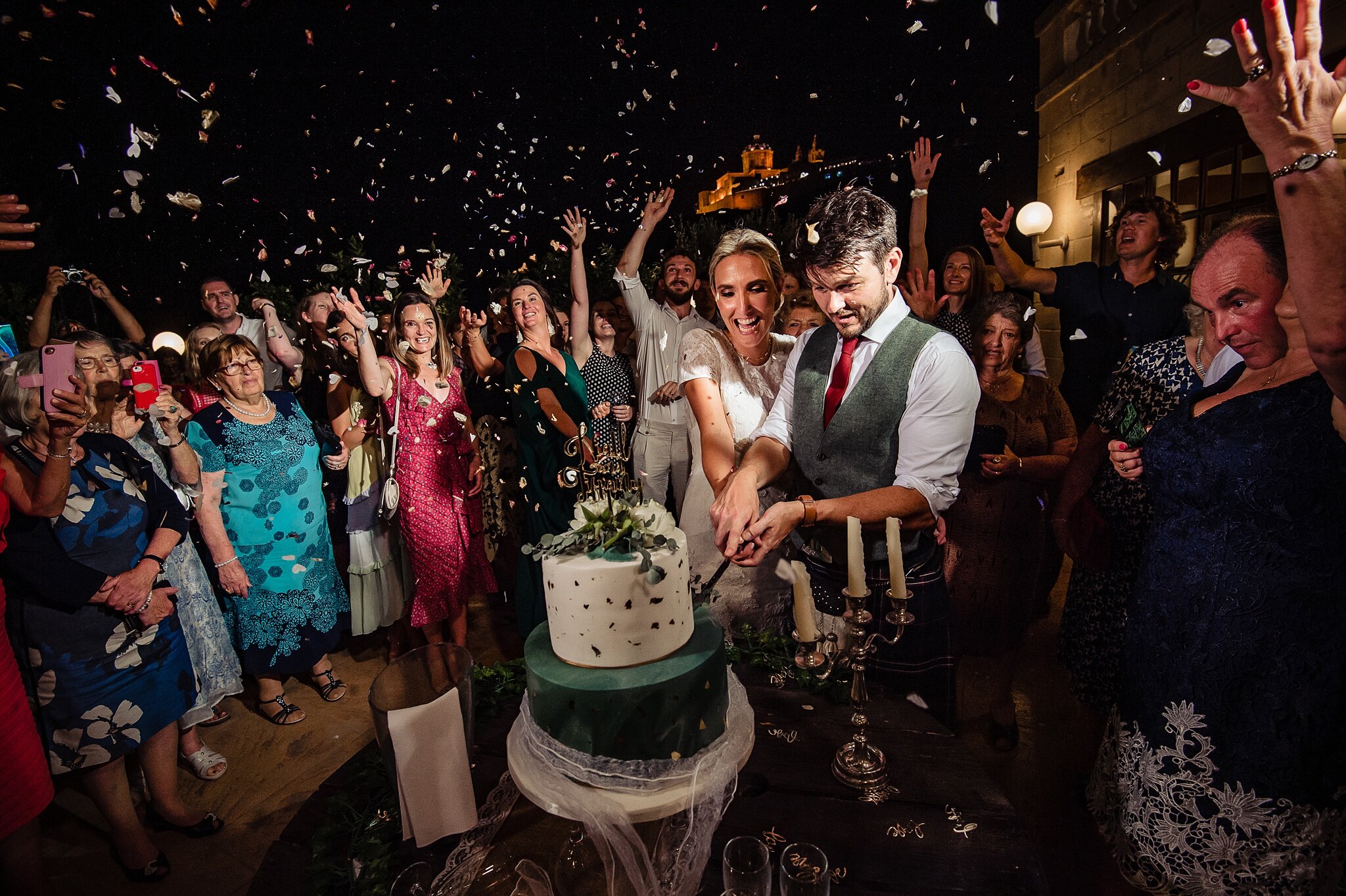Cutting of the cake at the Olive Gardens Mdina - Wedding Photography Malta - Shane P. Watts Photography
