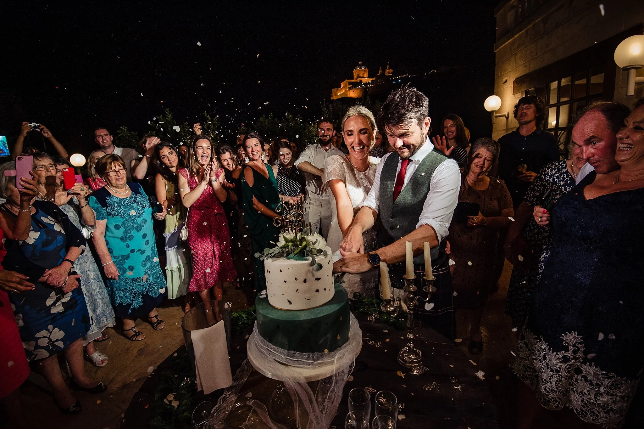 Cutting of the cake at the Olive Gardens Mdina - Wedding Photography Malta - Shane P. Watts Photography