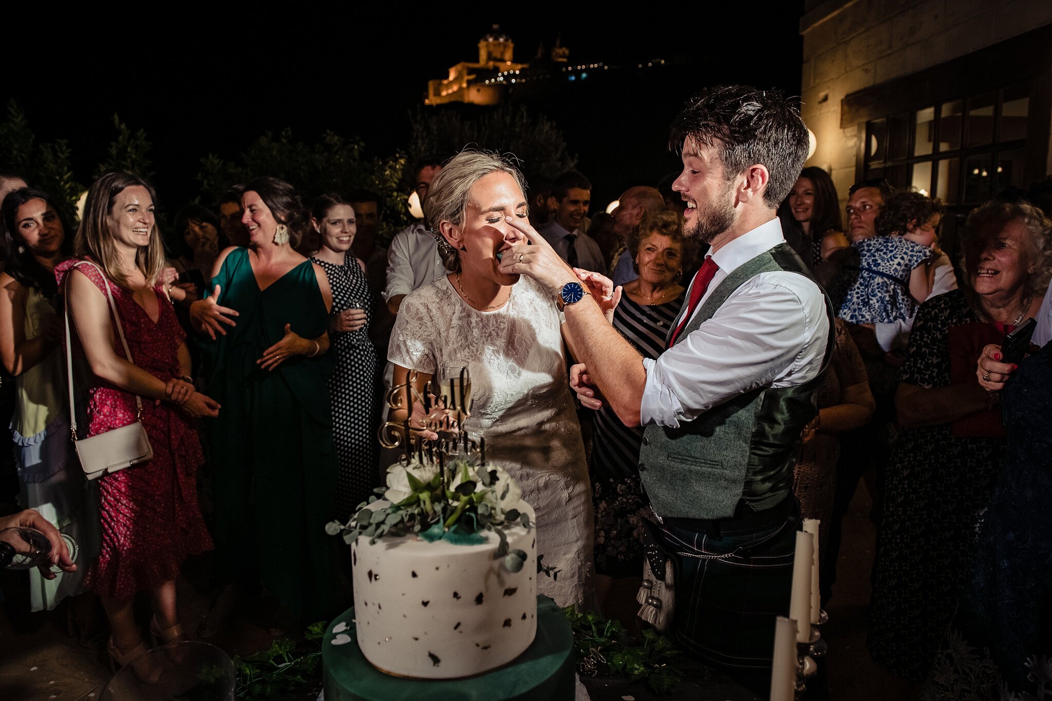 Cutting of the cake at the Olive Gardens Mdina - Wedding Photography Malta - Shane P. Watts Photography
